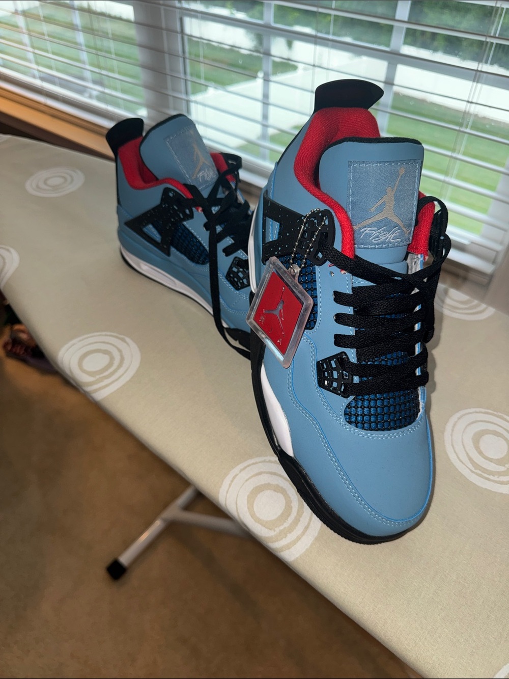 Jordan Men’s Sneakers in University Blue with Black & Red Accents